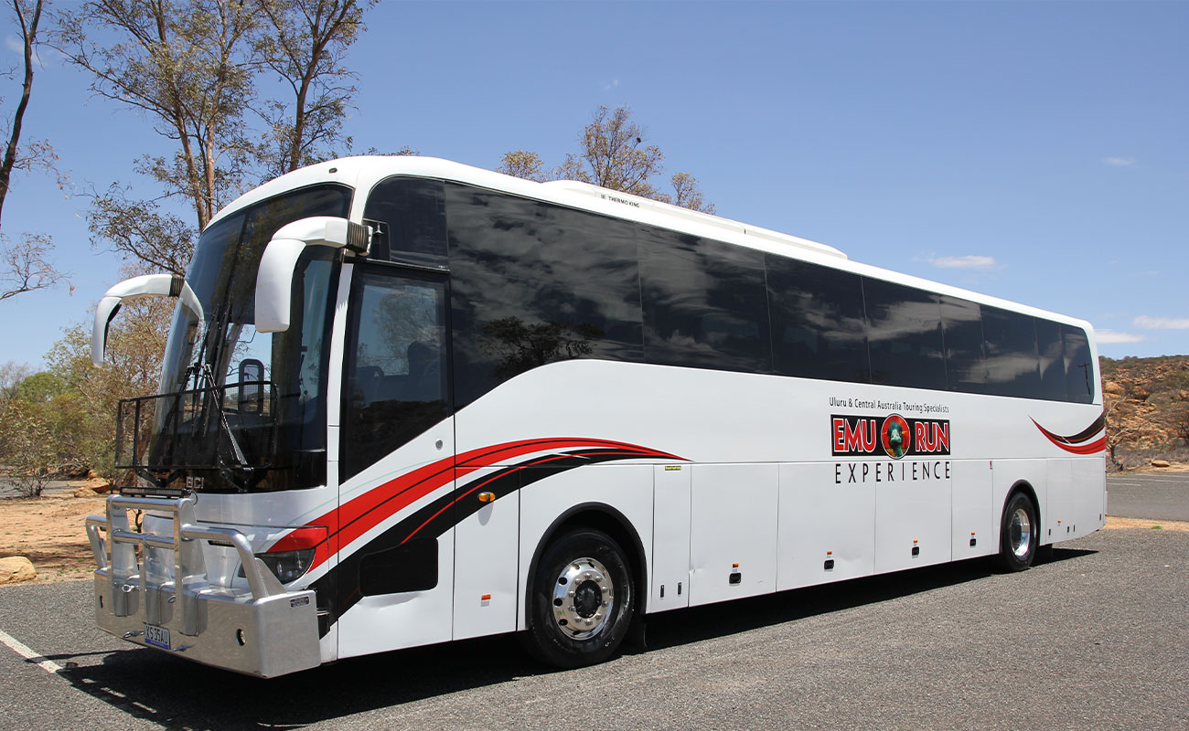 Catch the bus from Alice Springs to Uluru.